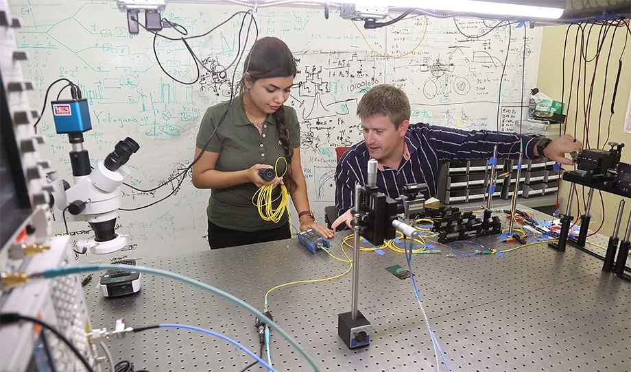 Samin Hanifi and Steven M. Bowers in a lab