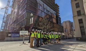 students gathered around Amazon headquarters front