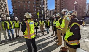 students gathered around Amazon headquarters front